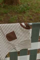 Cory Pocket Romper in Thin Chocolate Stripe
